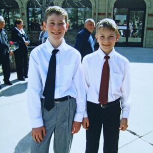 Andrew Sheedy is seen after his Confirmation in 2011 with his friend Joseph Marsiglio outside Holy Family Parish in St. Albert.